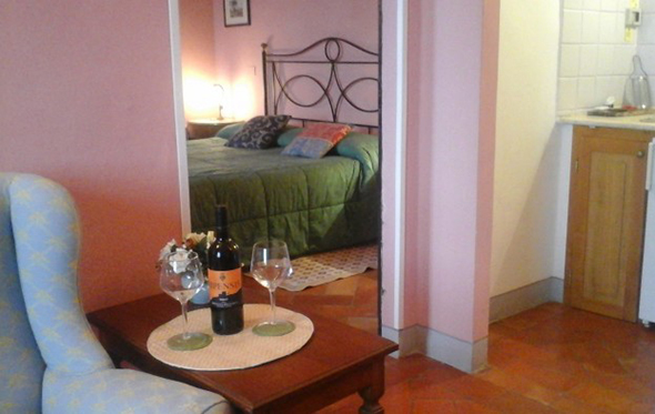 A glass of wine in your B&B room